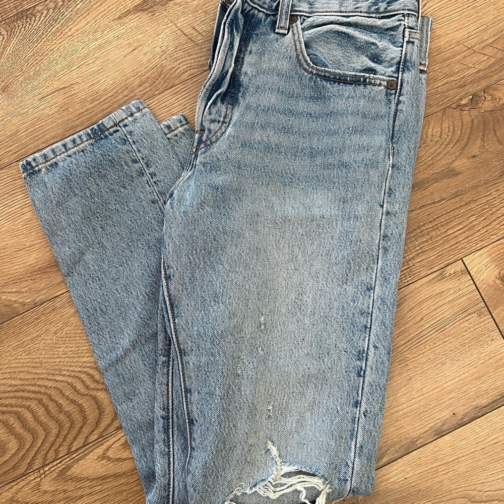 Levi’s 501 Light Blue Distressed Jeans